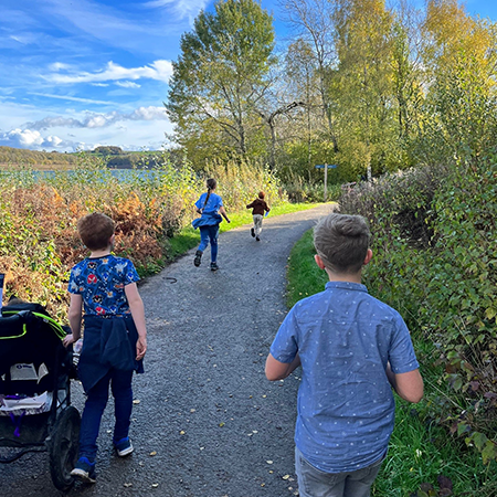 Children walking and running in the countryside